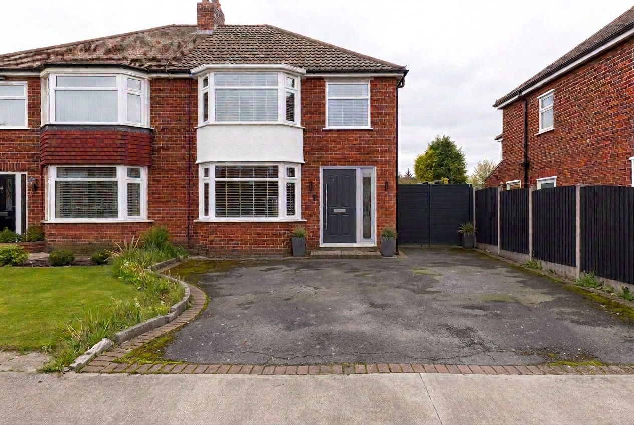 Tired worn tarmac driveway before transformation